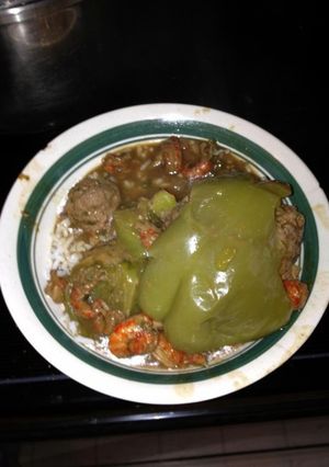 A picture of Angie's Crawfish Stew With Stuffed Bell peppers.