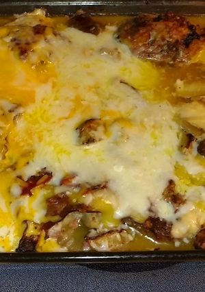 A picture of Baked Granny Smith Apple infused Chicken/with cheese.
