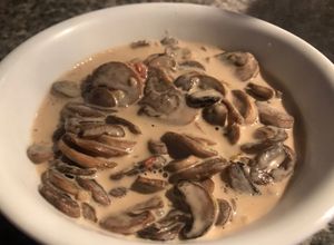 Una foto de Champiñones en crema de leche