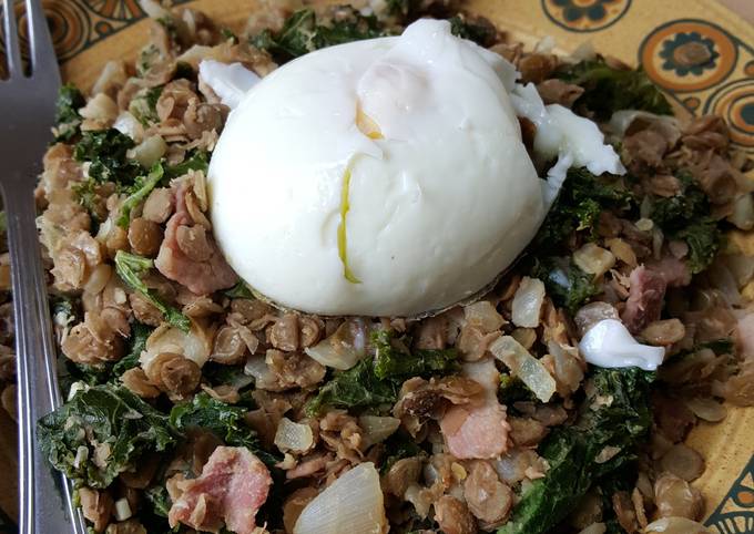 Warm lentil, bacon and kale salad with poached egg