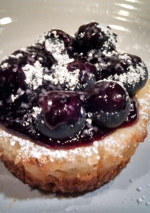 A picture of Mini Lemon and Blueberry Cheesecake Cupcakes.