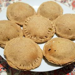 A picture of Mini Spinach-Feta pies.