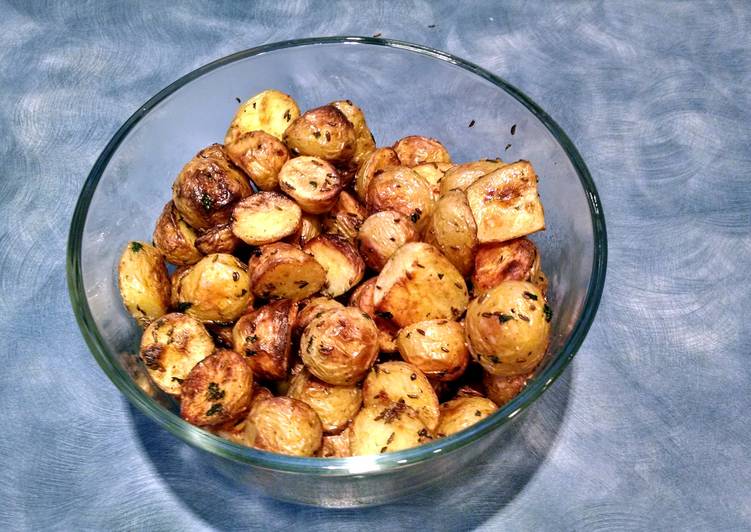 Steps to Make Perfect Caraway roasted new potatoes.