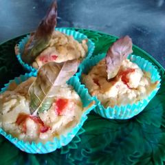 A picture of Red pepper and pine nut cupcake.