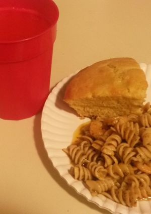 A picture of Shrimp Scampi w/ Rotini Noodles.