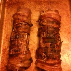 A picture of Bacon wrapped venison backstrap.