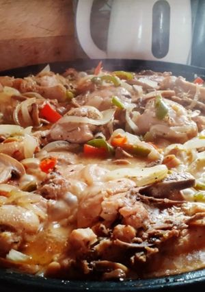 Una foto de Pollo al Disco con Champiñones