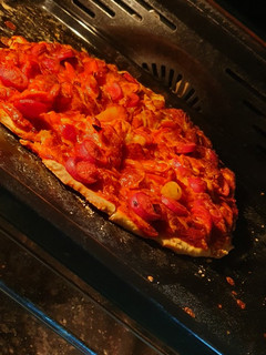 Una foto de Pizza jamón y queso con harina cervecera