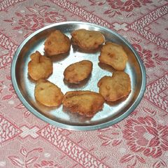A picture of Sweet fritters of sweet potato or sakarkandi ke pue.