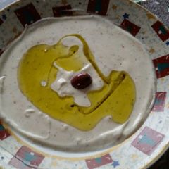 A picture of Yogurt and Tahini dip for pita bread and veggies.
