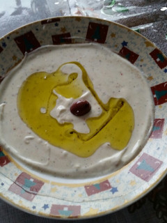 A picture of Yogurt and Tahini dip for pita bread and veggies.