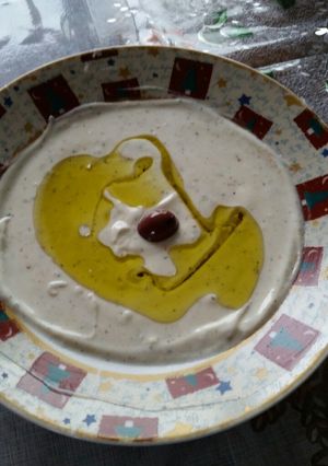 A picture of Yogurt and Tahini dip for pita bread and veggies.