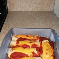 Shrimp spinach cream cheese Enchiladas A picture of Shrimp spinach cream cheese Enchiladas.
