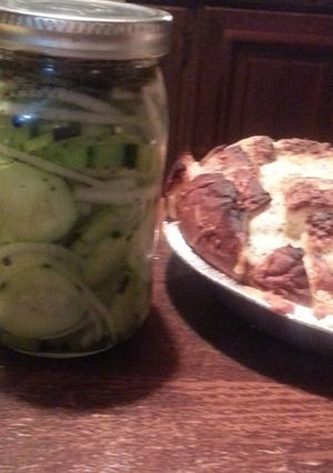 A picture of 2fer Italian pickles & onions and muh monkey bread.