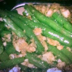 A picture of Green beans with Garlic-flaxseed breadcrumbs.