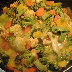 A picture of Vegetables and creamy turmeric sauce.