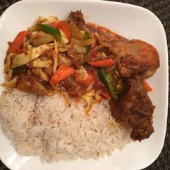 Ofada rice with chicken and vegetables A picture of Ofada rice with chicken and vegetables.