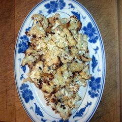 A picture of Roasted cauliflower and onions.