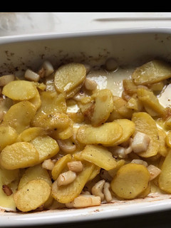 Una foto de Patatas con choco al horno