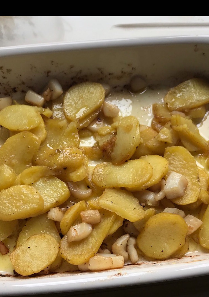 Una foto de Patatas con choco al horno
