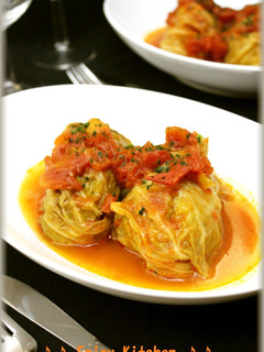 A picture of Cabbage and Cheese Rolls in Tomato Sauce.