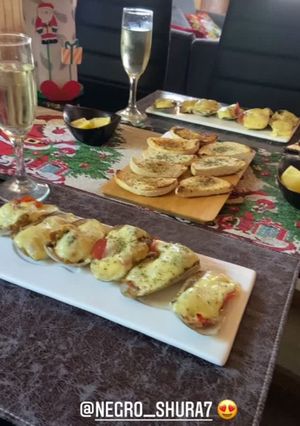 Una foto de Machas a la parmesana