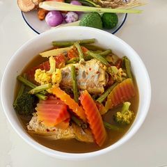 Kang - Som, Sour Soup Papaya With Ornate Threadfin Bream A picture of Kang - Som, Sour Soup Papaya With Ornate Threadfin Bream.