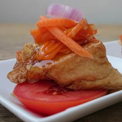 A picture of Tofu Appetizer With Carrot Plum Sauce.