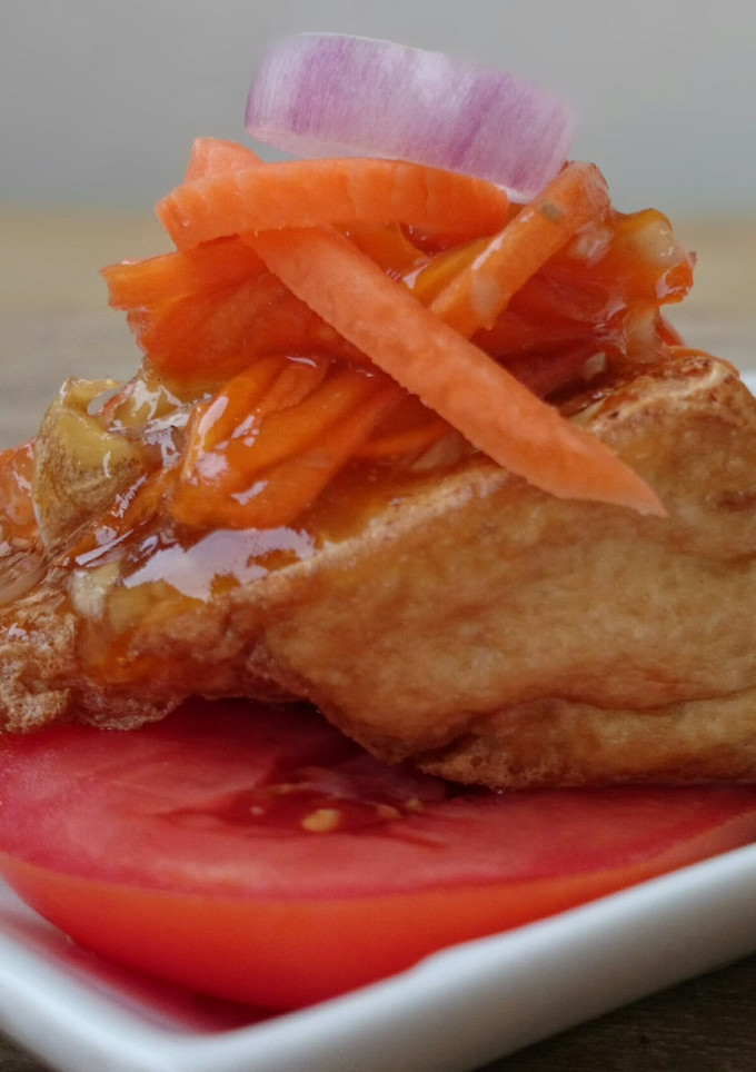 A picture of Tofu Appetizer With Carrot Plum Sauce.