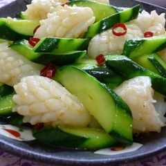 A picture of Chinese Stir-Fry with Squid and Cucumber.