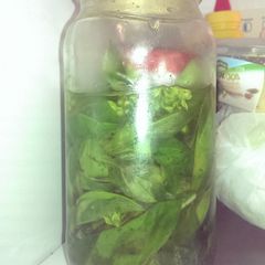 A picture of Preserved Basil in Olive Oil.