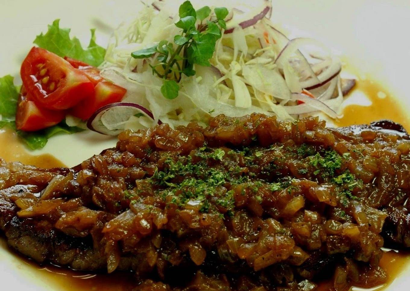 Beef steak with onion sauce