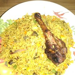 Fried rice with gezzard and chicken A picture of Fried rice with gezzard and chicken.