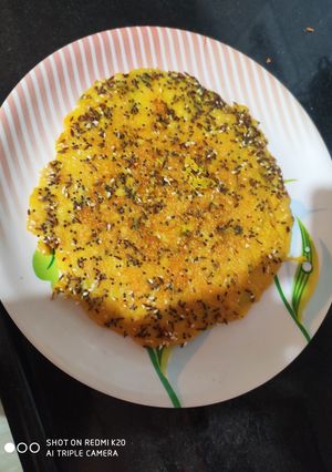 A picture of Aloo besan suji mix vegetable handvo.