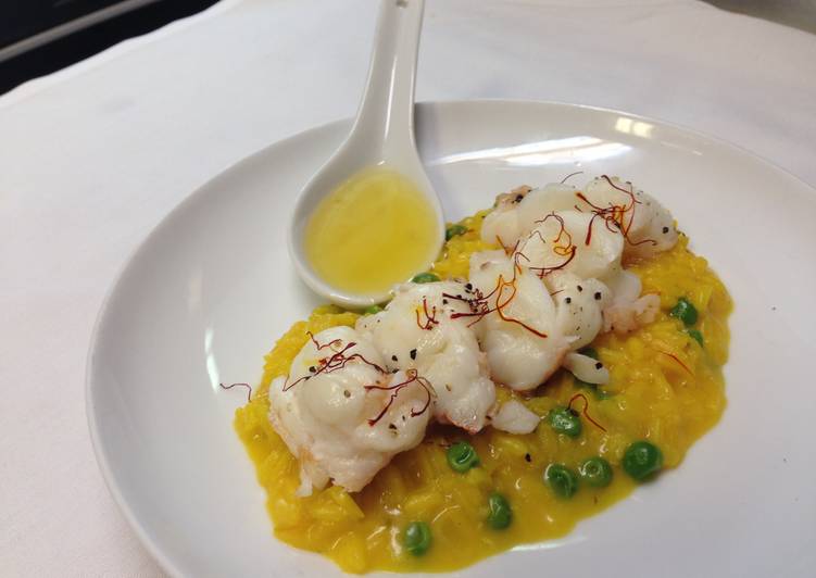 Lobster poached in vanilla bean butter served with saffron, sweet pea risotto
