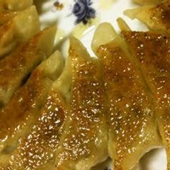 A picture of Easy Gyoza Dumplings with Crispy Skins and Juicy Insides.