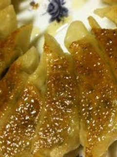 A picture of Easy Gyoza Dumplings with Crispy Skins and Juicy Insides.