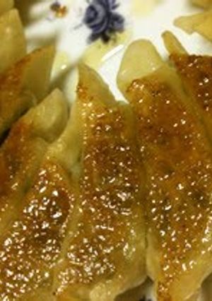 A picture of Easy Gyoza Dumplings with Crispy Skins and Juicy Insides.