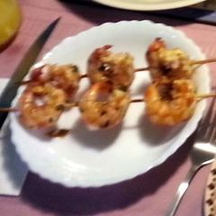 A picture of Marinated grilled shrimp.