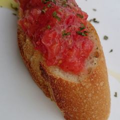 A picture of Pan Con Tomato (SPANISH APPETIZER).