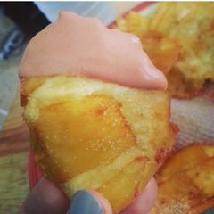 A picture of Fried Breadfruit (Tostones de pana) with "Fancy Sauce" (Mayo/ketchup).