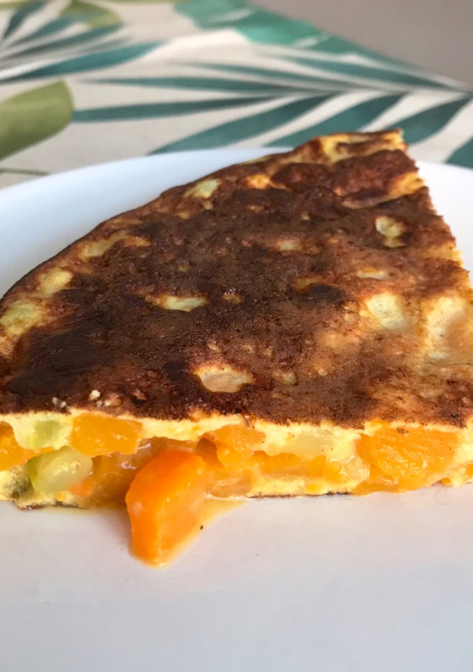 Una foto de Tortilla de calabaza y calabacín