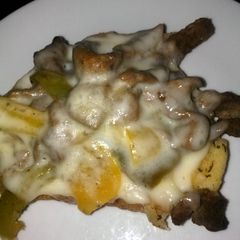 A picture of philly cheese steak on 5 cheese Texas toast.