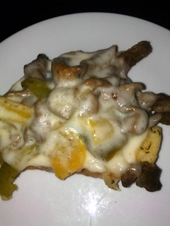 A picture of philly cheese steak on 5 cheese Texas toast.