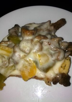 A picture of philly cheese steak on 5 cheese Texas toast.