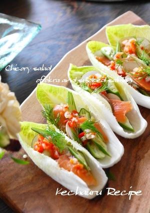 A picture of Salmon & Okra on an Endive Boat with Paprika Salsa.