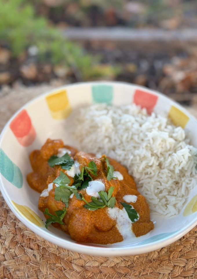 Una foto de Butter chicken estilo indio