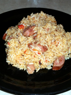 A picture of Jambalaya w/sausage, shrimp and ham.