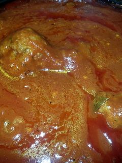 A picture of Homemade Meatballs and Sauce.