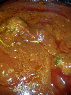 A picture of Homemade Meatballs and Sauce.